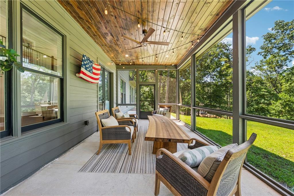 3394 Robinson Road Gainesville, GA 30506 - Photo 40 of 51 a sitting area with furniture and wooden deck