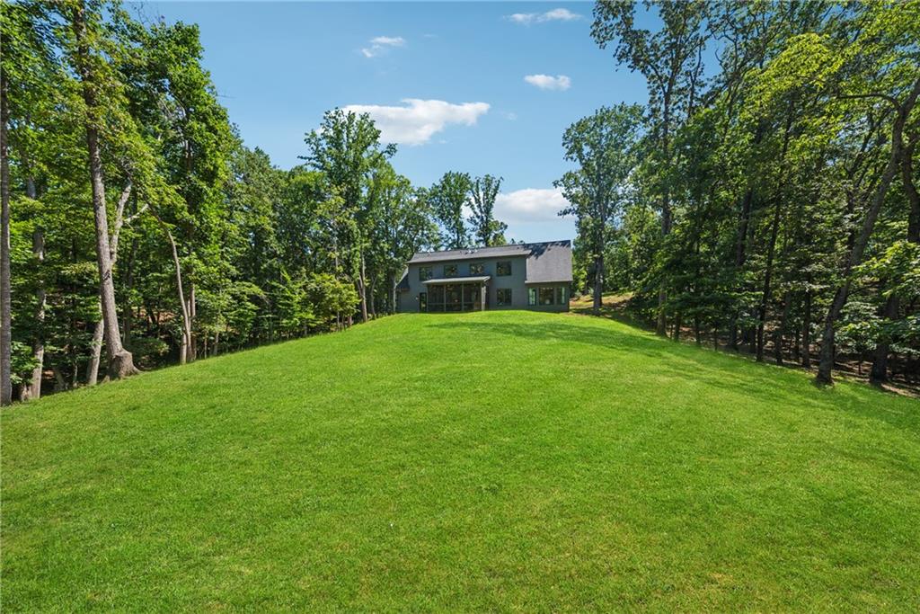 3394 Robinson Road Gainesville, GA 30506 - Photo 44 of 51 a view of a house with a backyard