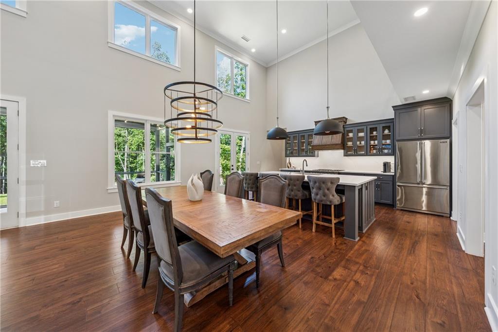 3394 Robinson Road Gainesville, GA 30506 - Photo 10 of 51 a view of a dining room with furniture and wooden floor
