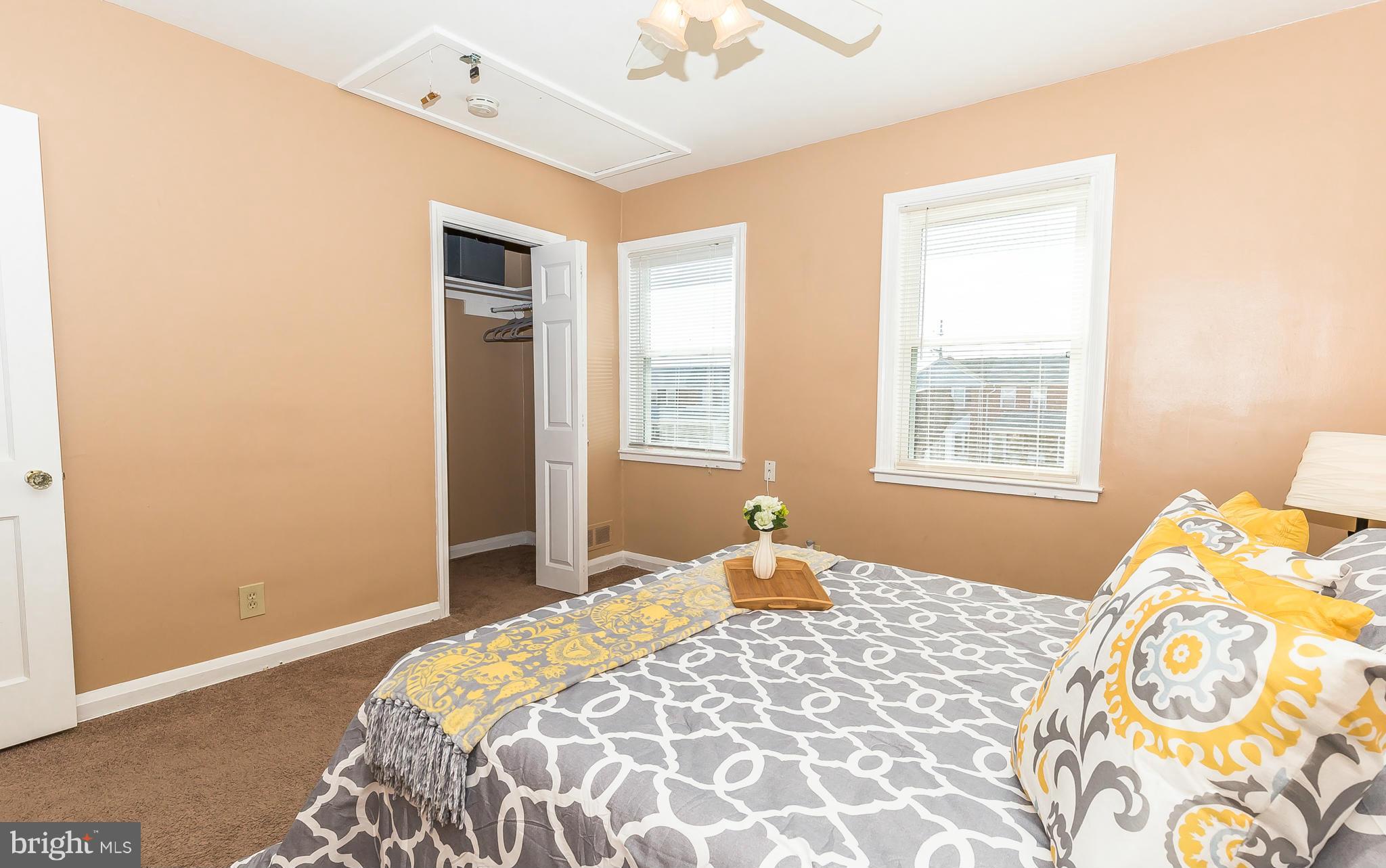 3417 Dunran Road Dundalk, MD 21222 - Photo 13 of 29 a bedroom with a bed and a window