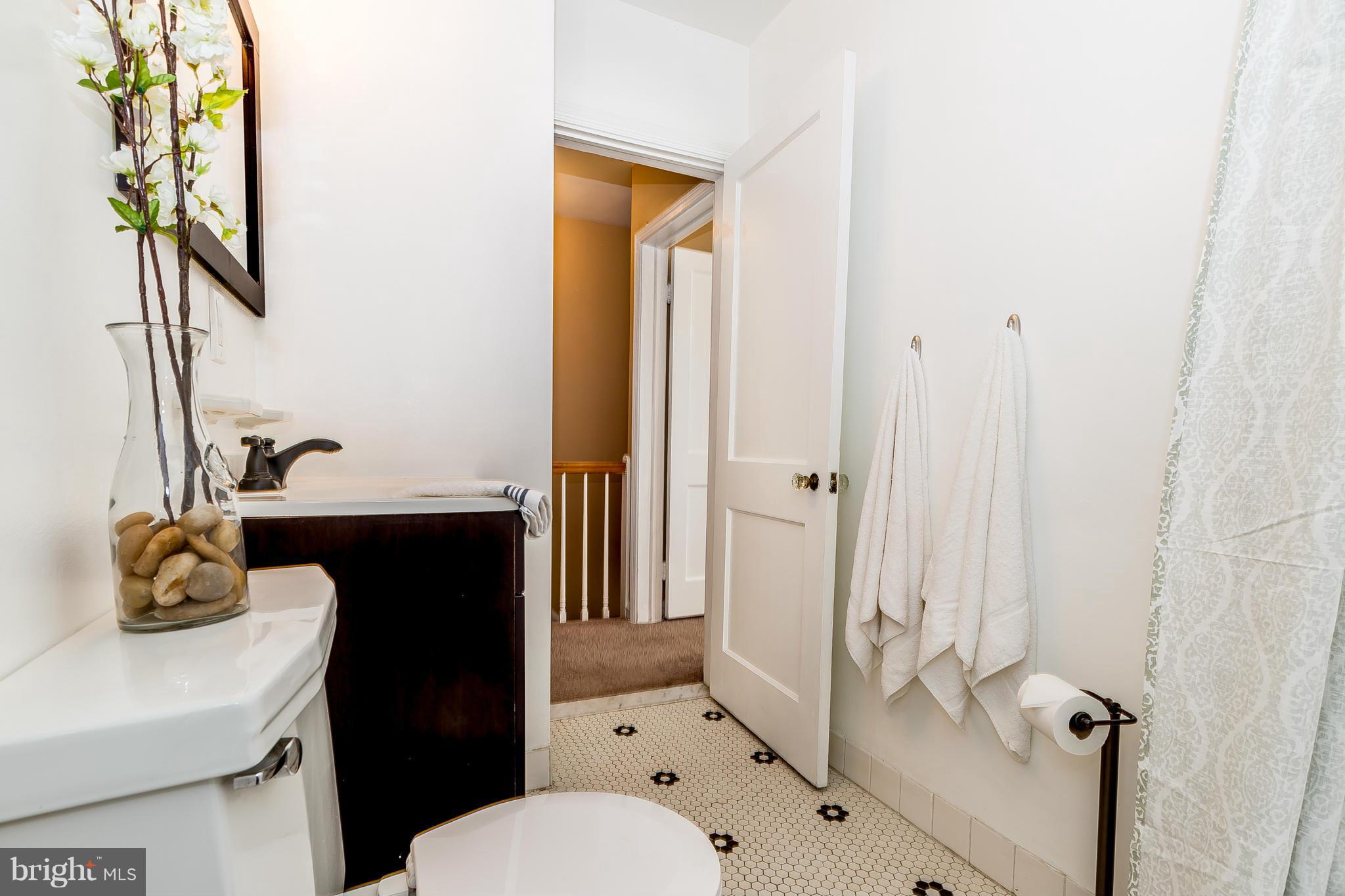 3417 Dunran Road Dundalk, MD 21222 - Photo 17 of 29 a bathroom with a sink toilet and shower