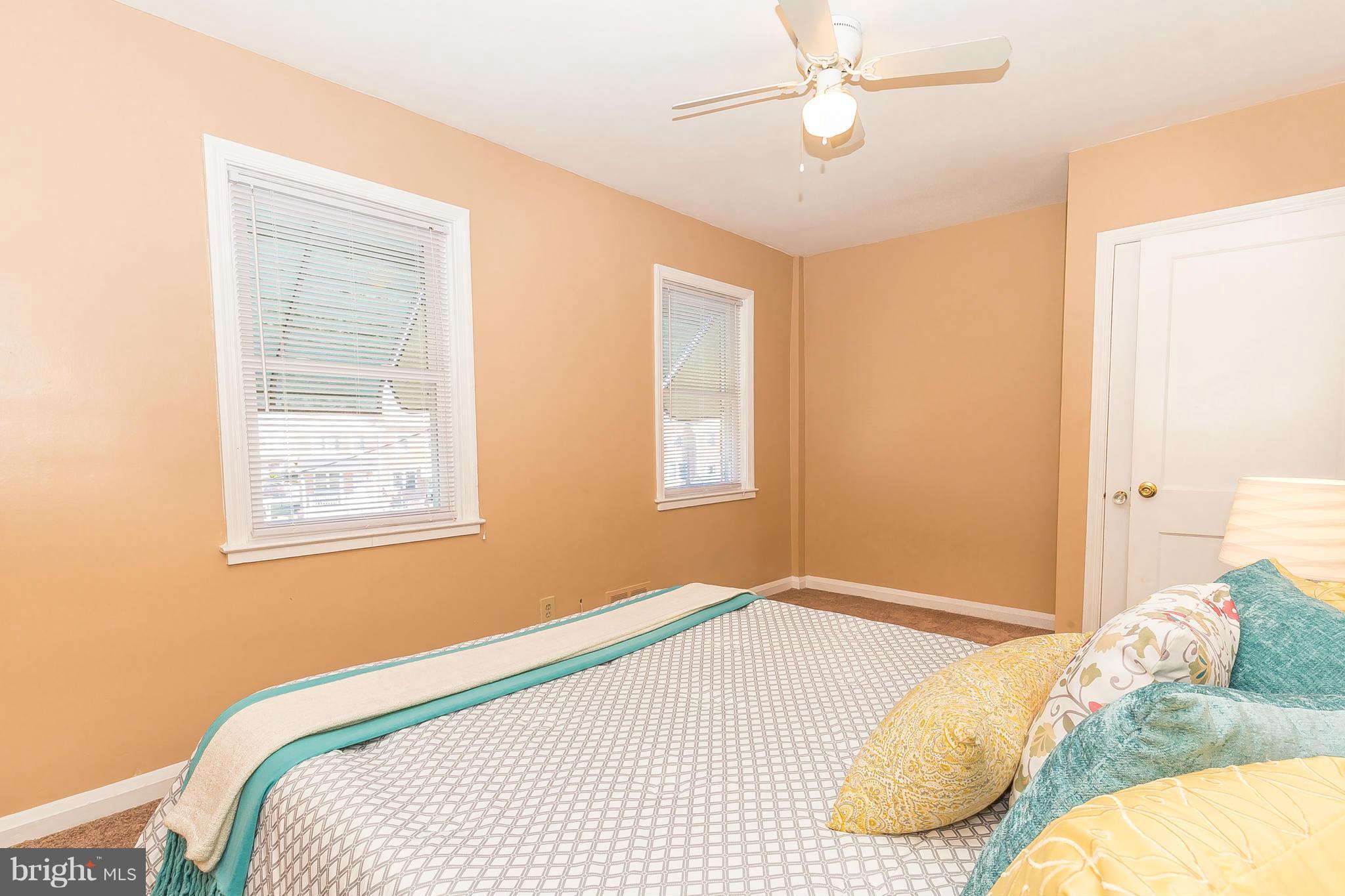 3417 Dunran Road Dundalk, MD 21222 - Photo 18 of 29 a bedroom with a bed and a window