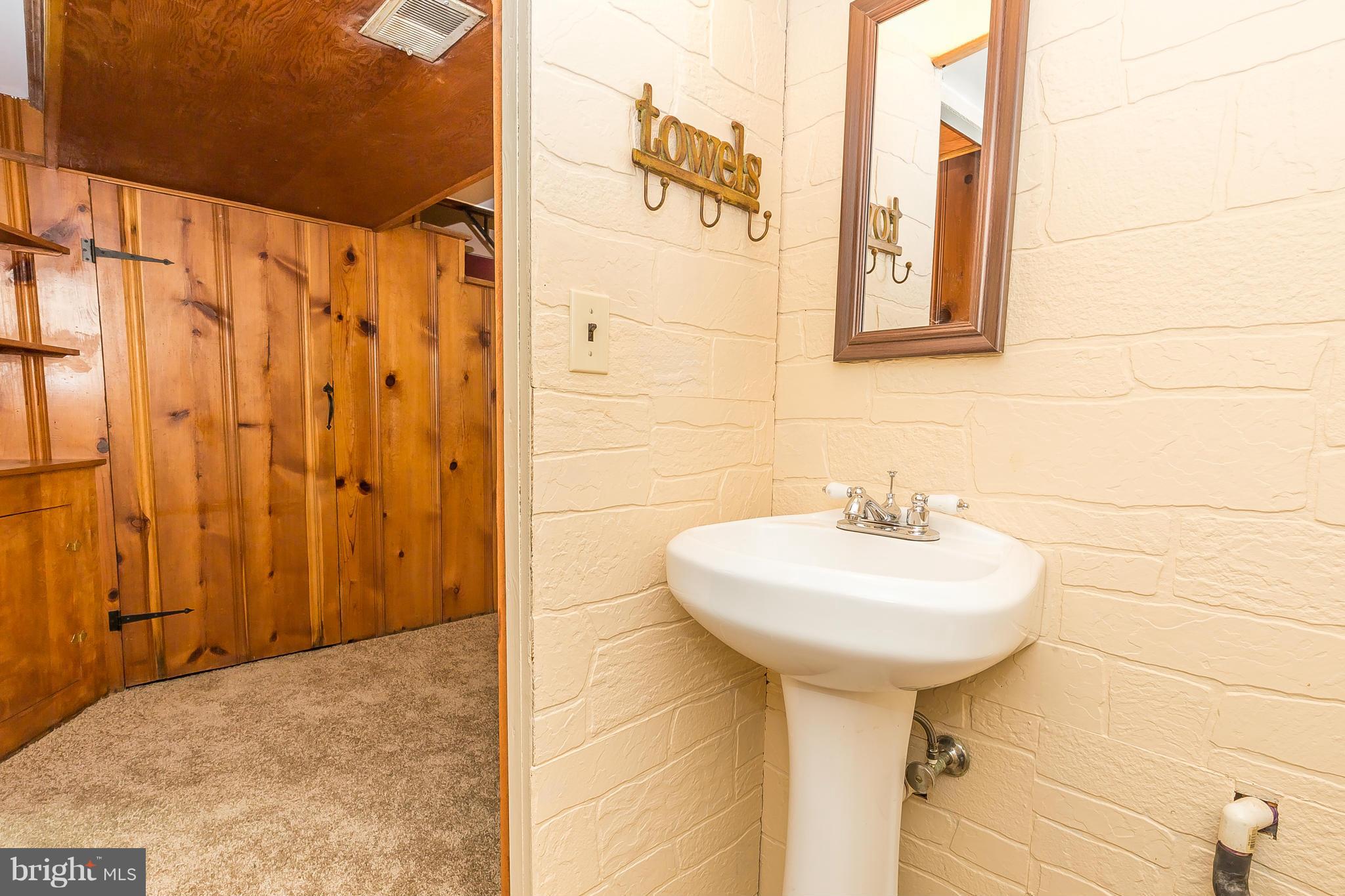 3417 Dunran Road Dundalk, MD 21222 - Photo 24 of 29 a bathroom with a sink toilet