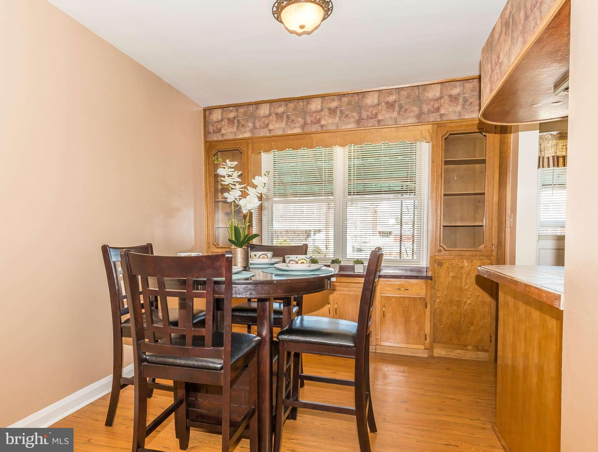3417 Dunran Road Dundalk, MD 21222 - Photo 6 of 29 a view of a dining room with furniture window and outside view