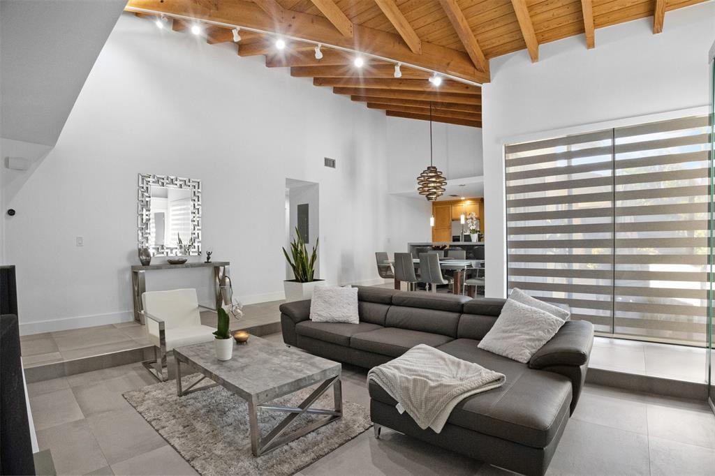 8125 Royal Palm Court, Unit 2 Tamarac, FL 33321 - Photo 2 of 35 a living room with furniture and a window