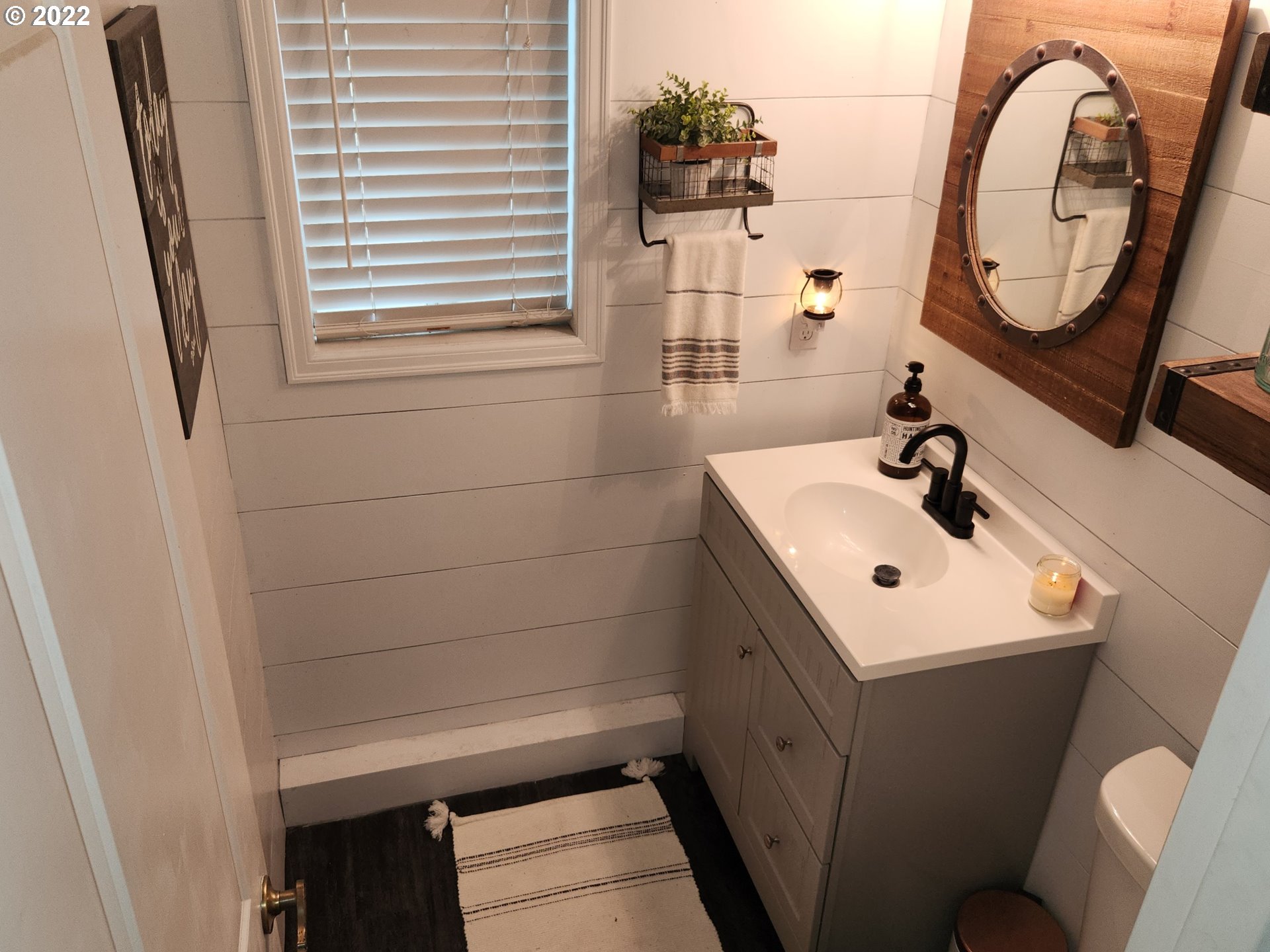 480 72nd Street Springfield, OR 97478 - Photo 16 of 24 a bathroom with a sink and a mirror