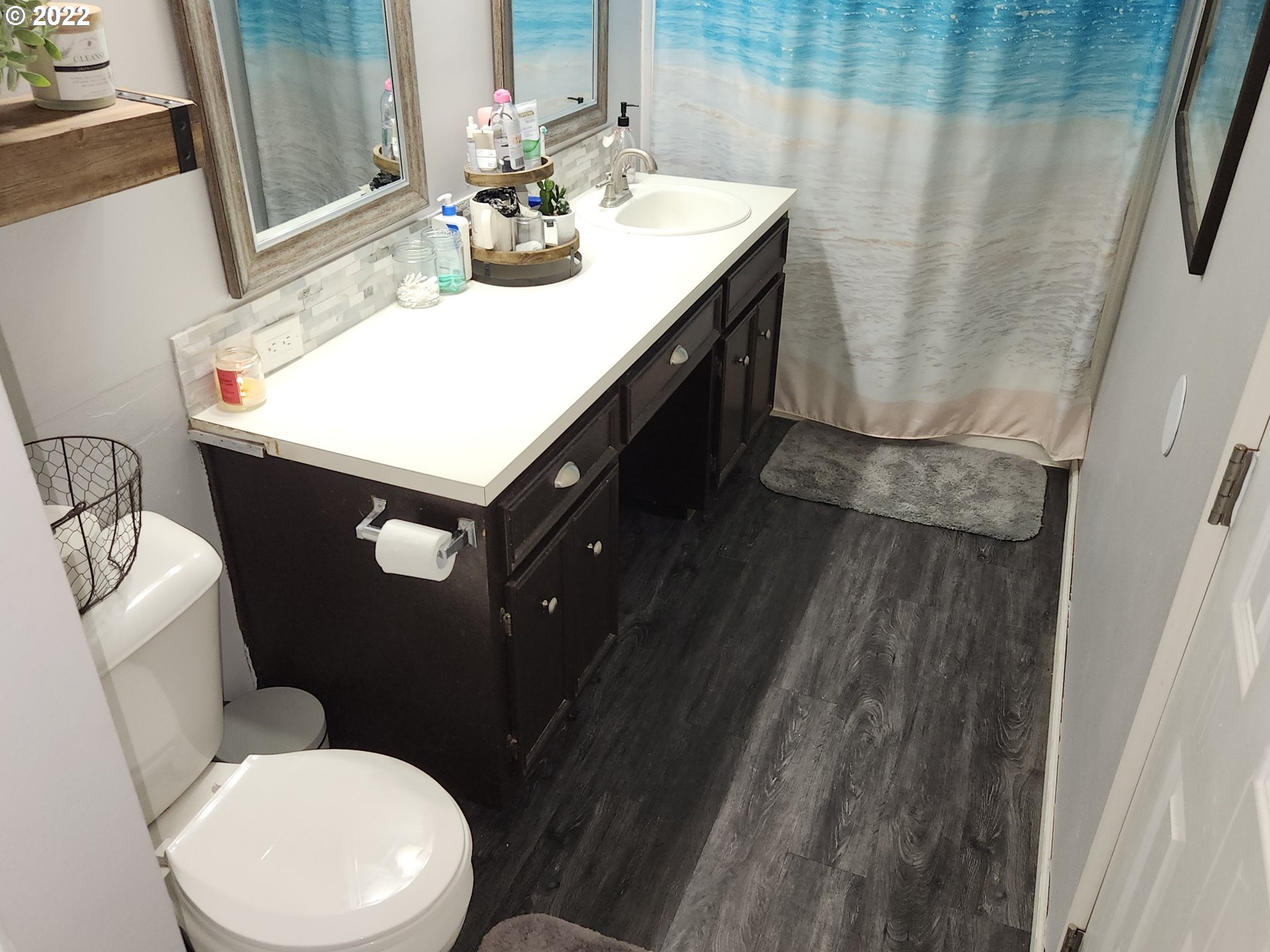 480 72nd Street Springfield, OR 97478 - Photo 21 of 24 a bathroom with a sink toilet and mirror