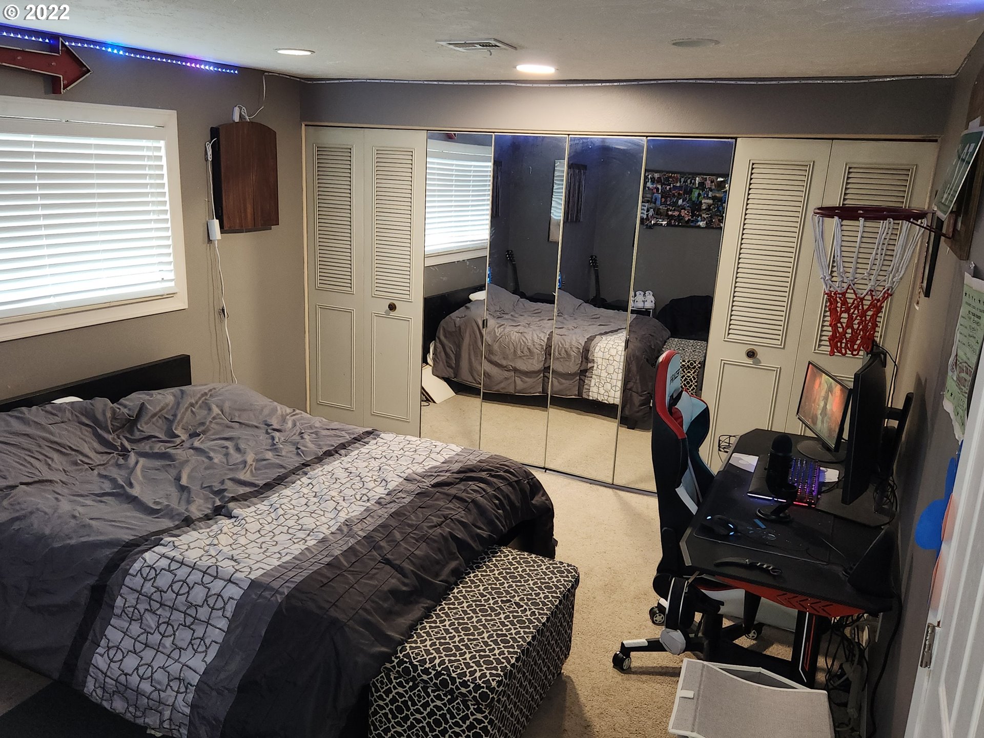 480 72nd Street Springfield, OR 97478 - Photo 22 of 24 a bedroom with a bed and wooden floor