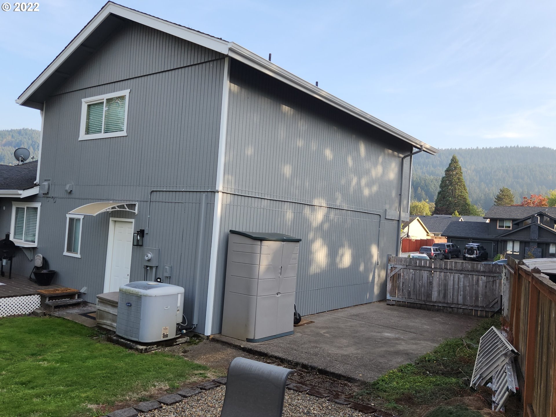 480 72nd Street Springfield, OR 97478 - Photo 6 of 24 a backyard of a house with table and chairs