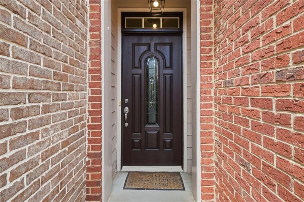 1114 Firethorne Pass Cumming, GA 30040 - Photo 3 of 43 a view of an entryway door