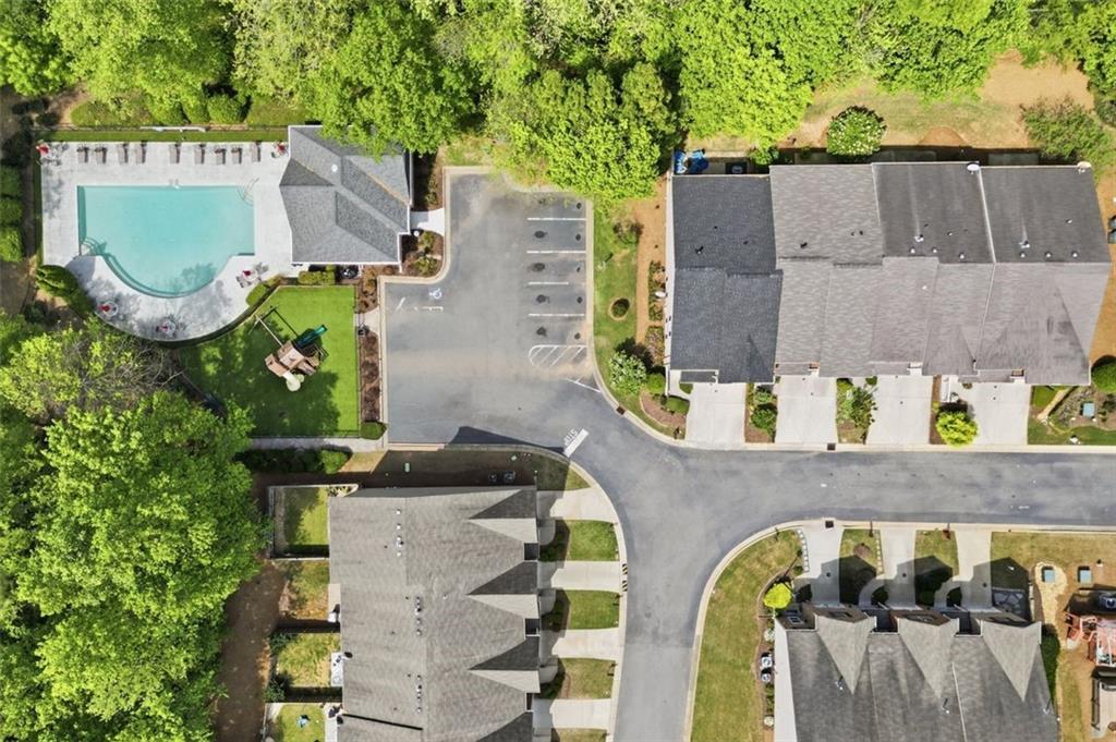 1114 Firethorne Pass Cumming, GA 30040 - Photo 39 of 43 an aerial view of a house with a swimming pool