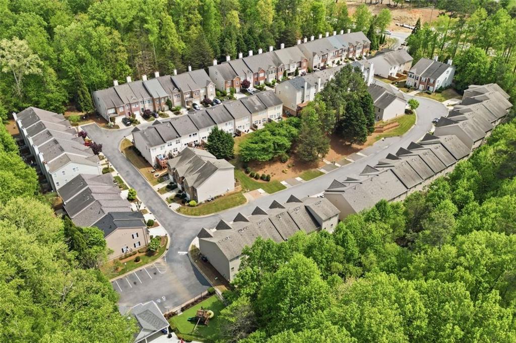 1114 Firethorne Pass Cumming, GA 30040 - Photo 40 of 43 an aerial view of residential house with outdoor space and a street view