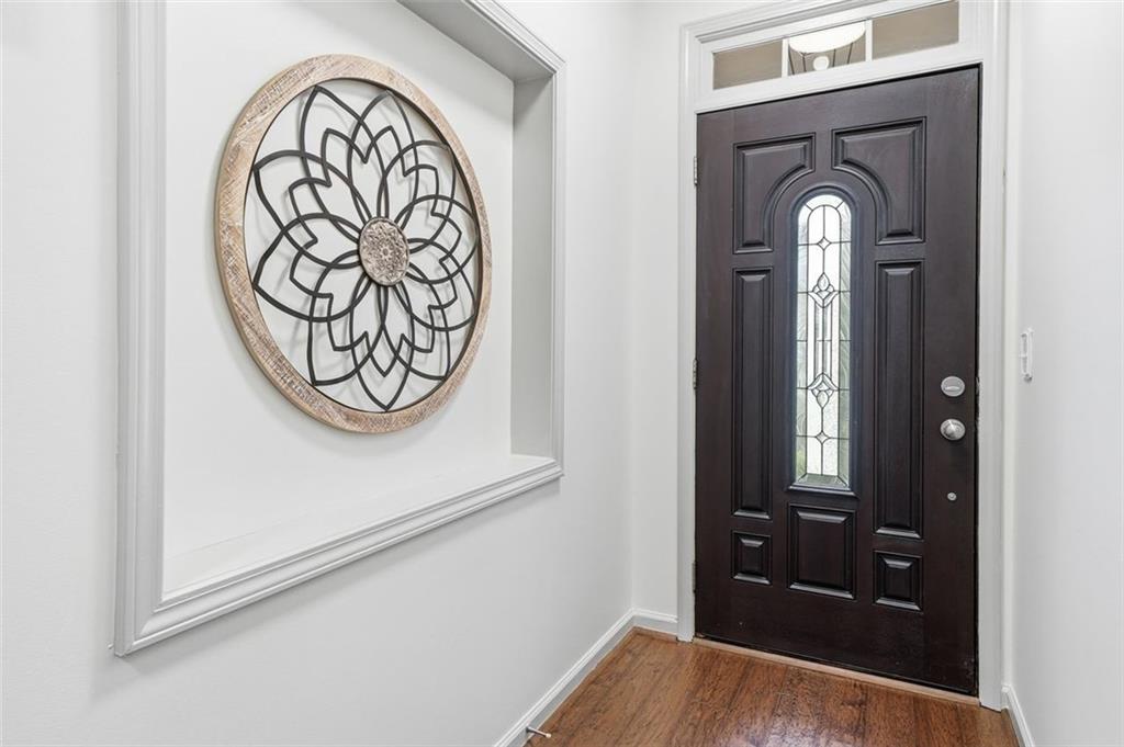 1114 Firethorne Pass Cumming, GA 30040 - Photo 5 of 43 a view of a entryway with wooden floor