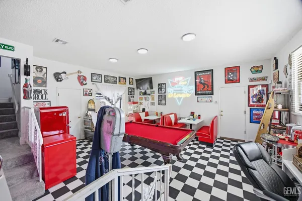 a room with musical instruments and walls