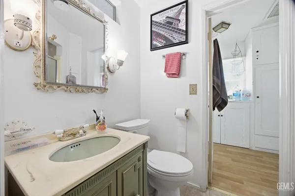 a bedroom with a bed and a cabinets