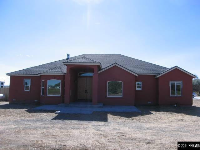 4805 Rancheria Road Fallon, NV 89406 - Photo 1 of 13 a front view of a house with a yard