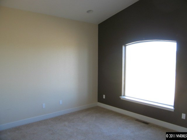 4805 Rancheria Road Fallon, NV 89406 - Photo 8 of 13 an empty room with a window
