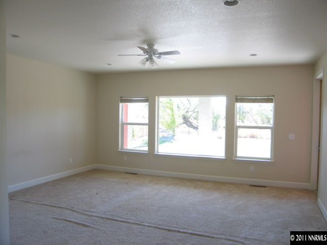 4805 Rancheria Road Fallon, NV 89406 - Photo 9 of 13 an empty room with a window