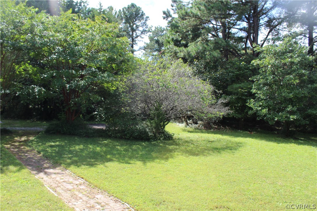 2610 Corner Rock Road Midlothian, VA 23113 - Photo 7 of 15 a view of a backyard of a house