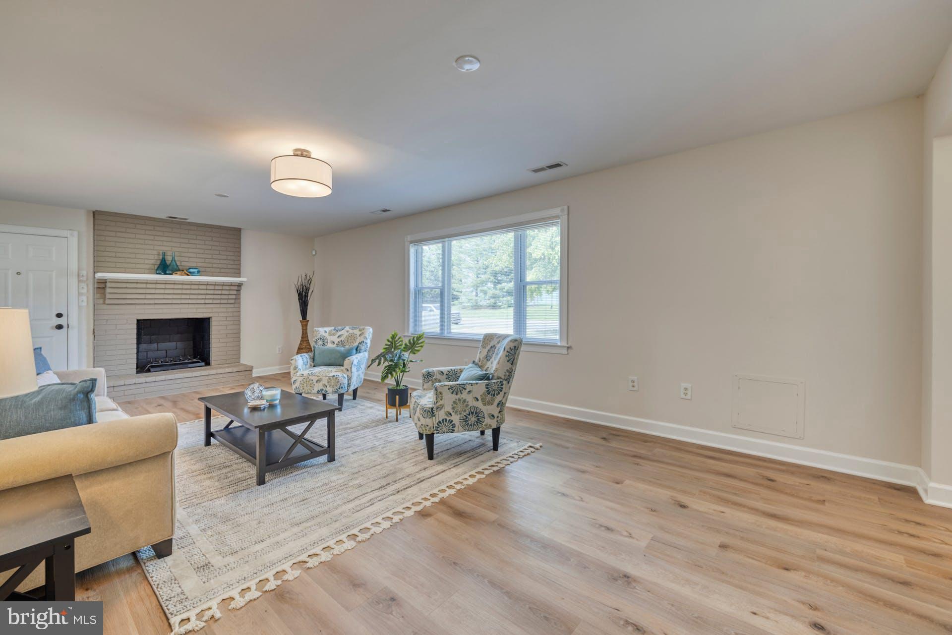 7716 Fordson Road Alexandria, VA 22306 - Photo 14 of 48 Family Rm has cozy fireplace