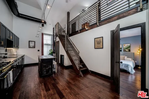 a view of an entryway and livingroom with furniture