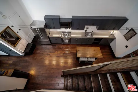 a living room with furniture and flat screen tv