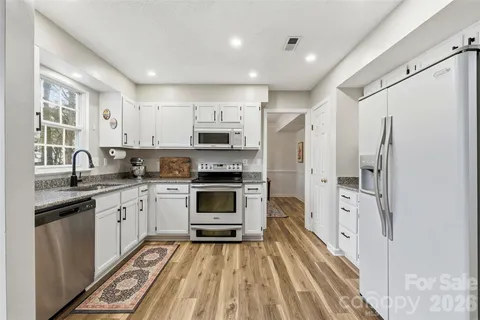 $450,000 | 12208 Woodbend Drive, Matthews, NC 28105