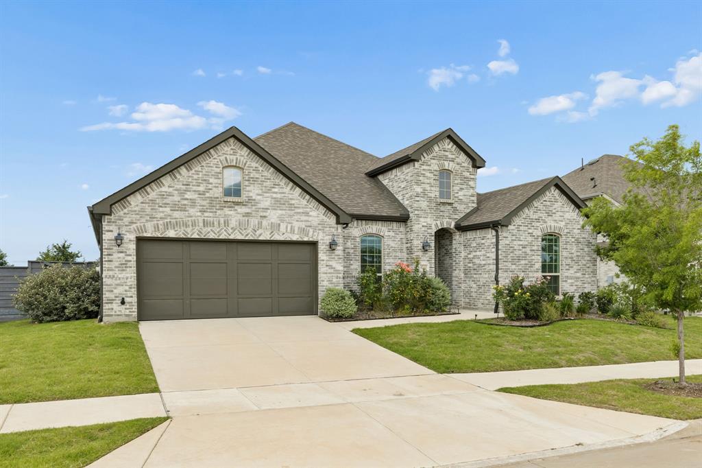 4933 Switchback Street Little Elm, TX 76227 - Photo 32 of 33 On a perfect lot backing to trees and green space and fronting the gorgeous Central Park of Union Park, this location is prime!