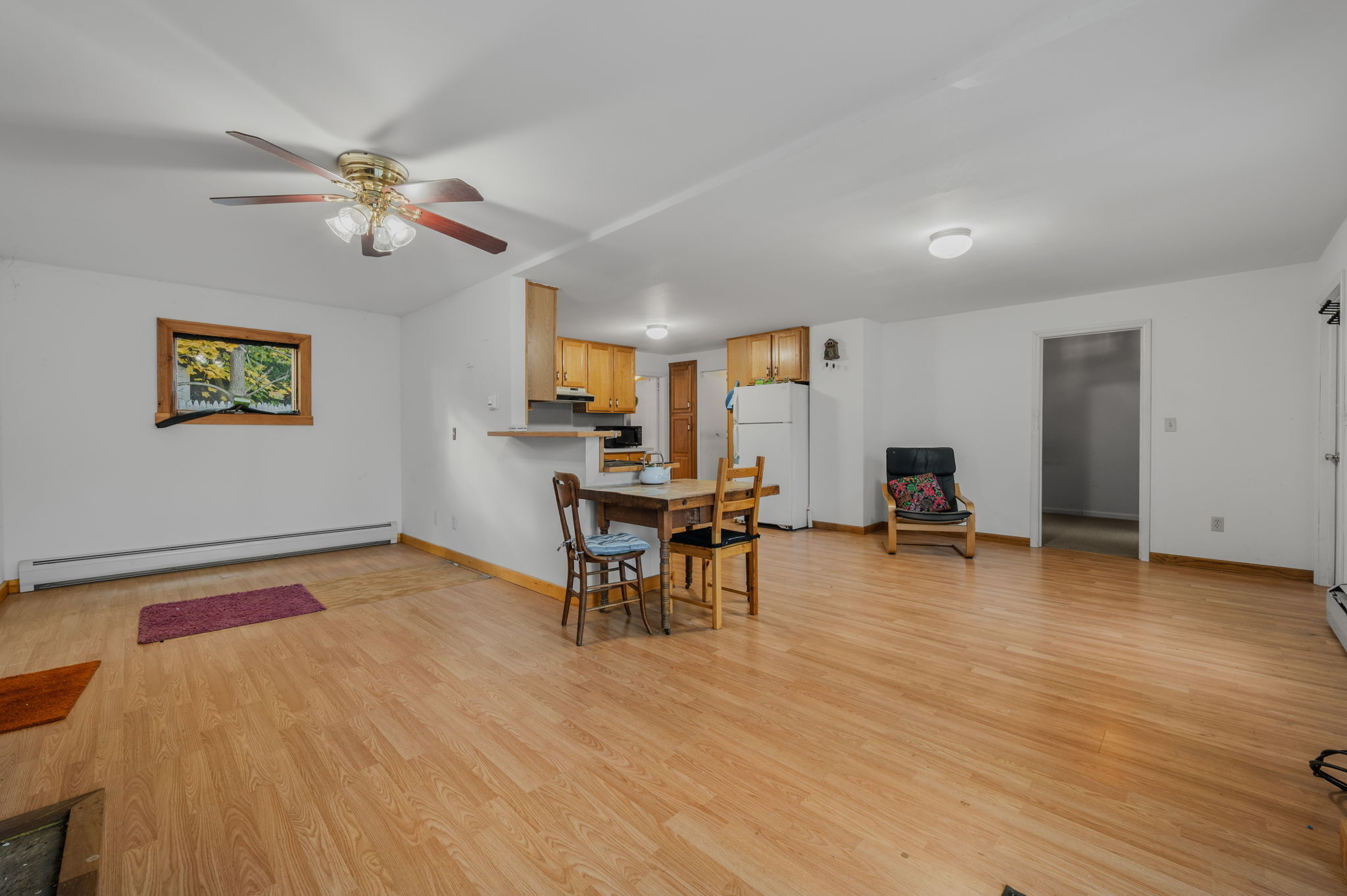 68 Clark Lane Waterford, CT 06385 - Photo 11 of 28 a view of a livingroom with furniture and a table chairs