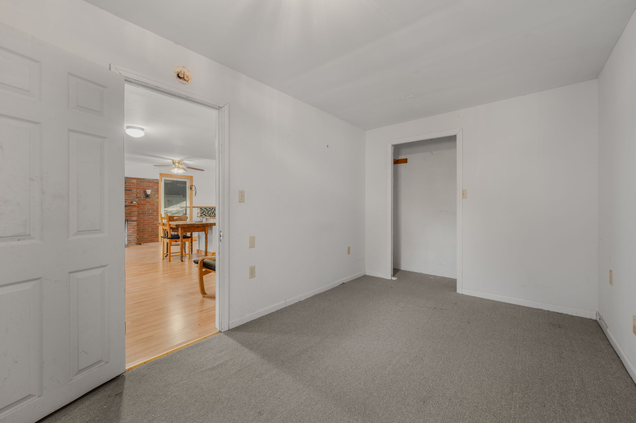 68 Clark Lane Waterford, CT 06385 - Photo 24 of 28 an empty room with closet and a yard