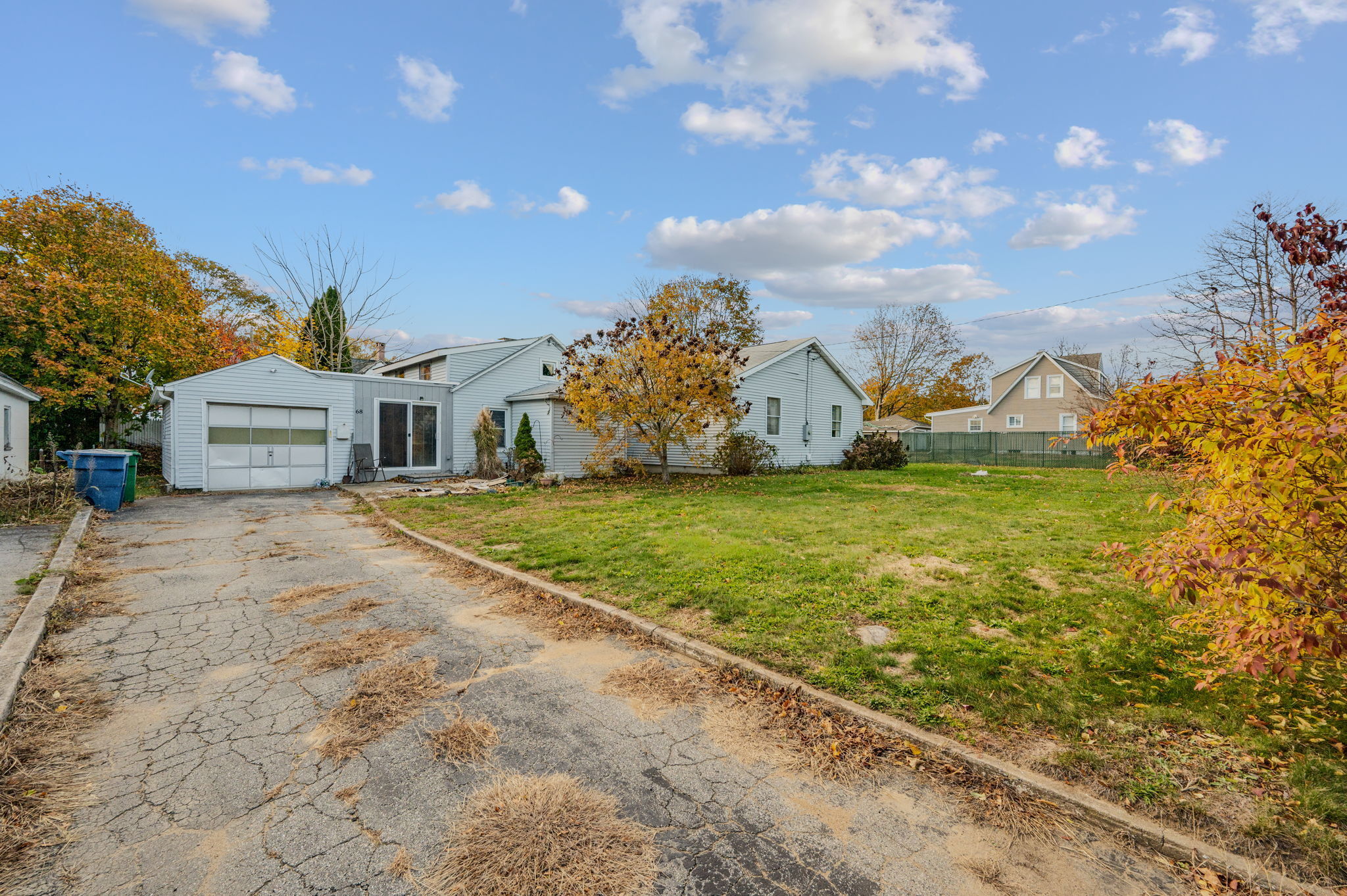 68 Clark Lane Waterford, CT 06385 - Photo 27 of 28 a view of a house with a yard