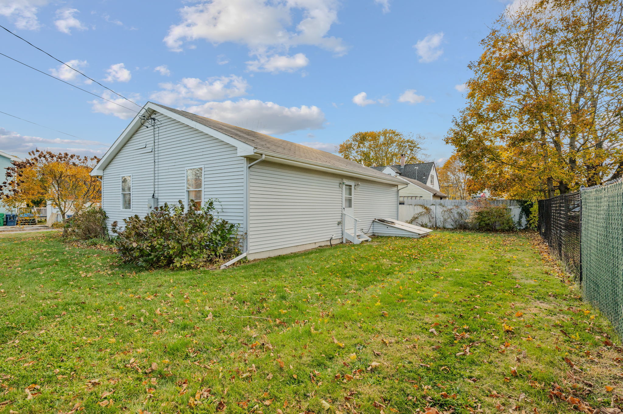 68 Clark Lane Waterford, CT 06385 - Photo 4 of 28 a view of backyard of house and green space