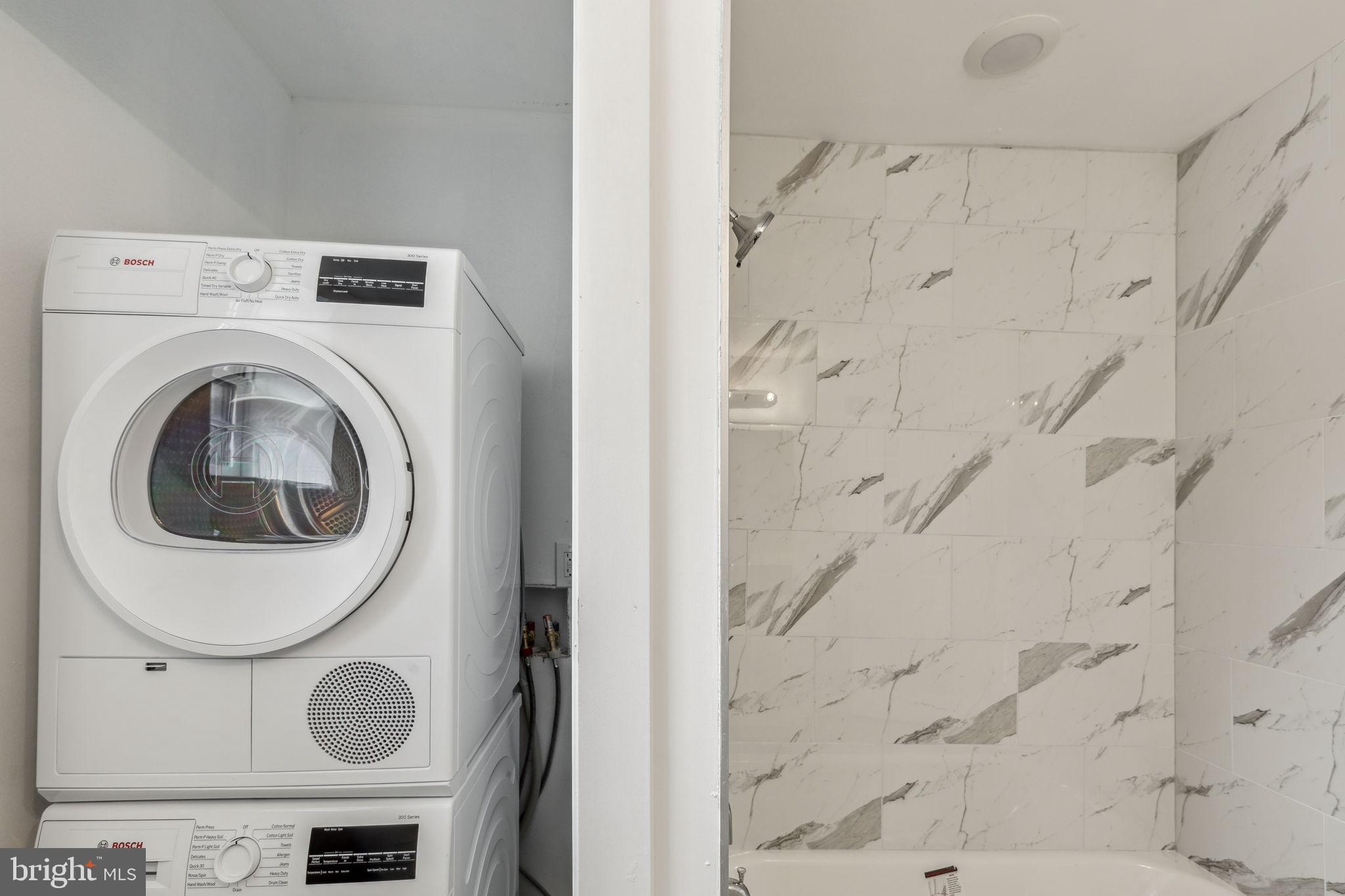 7041 Ridge Avenue Philadelphia, PA 19128 - Photo 18 of 22 a utility room with dryer and washer