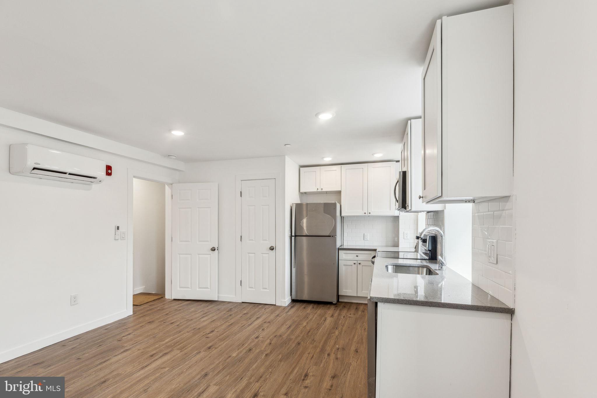 7041 Ridge Avenue Philadelphia, PA 19128 - Photo 21 of 22 a view of kitchen with wooden floor