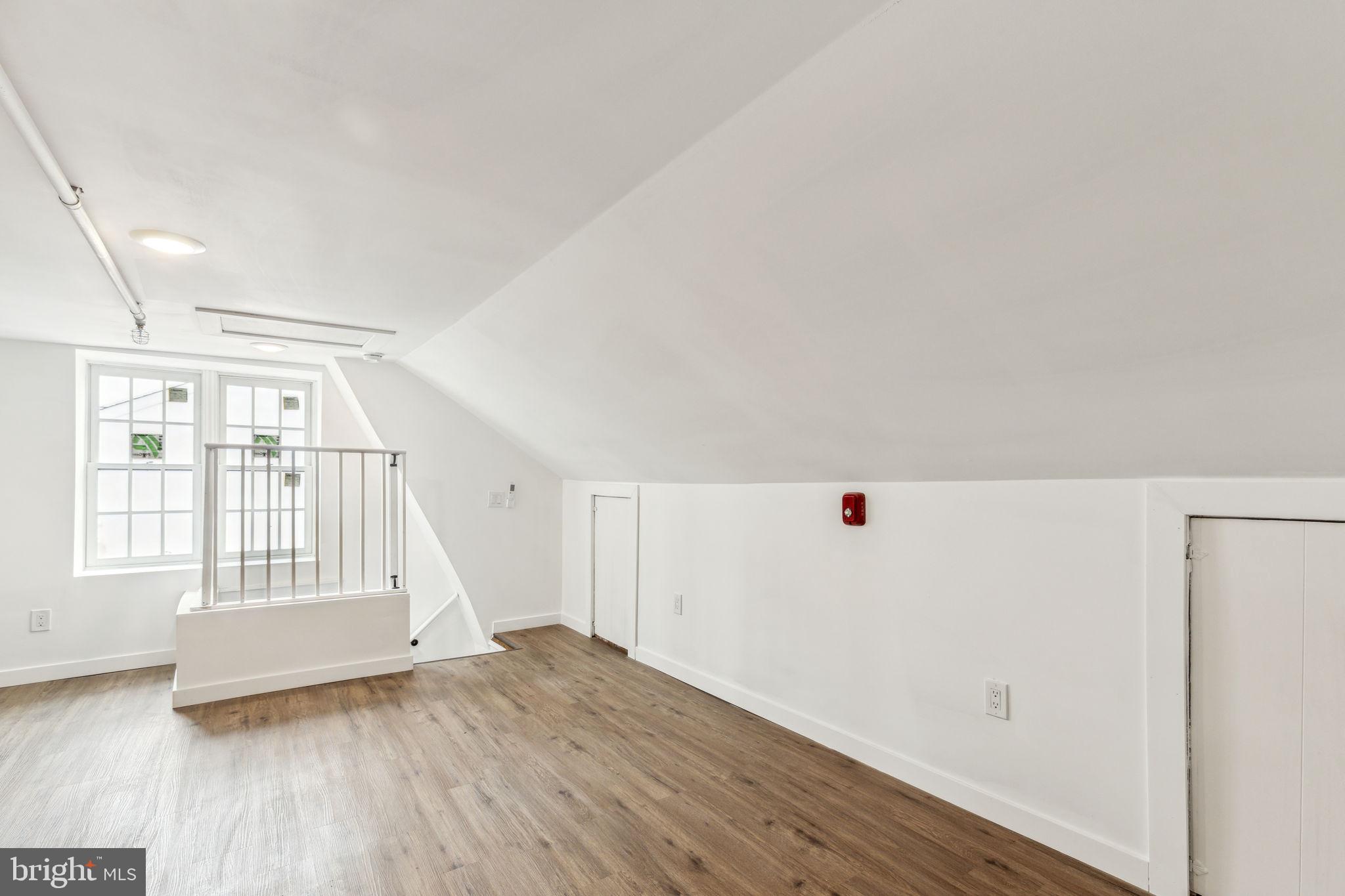 7041 Ridge Avenue Philadelphia, PA 19128 - Photo 8 of 22 wooden floor in an empty room