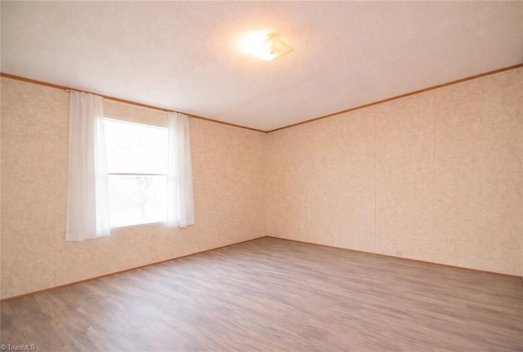 5600 Bunch Road Oak Ridge, NC 27310 - Photo 13 of 30 Primary Bedroom