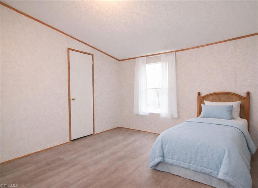 5600 Bunch Road Oak Ridge, NC 27310 - Photo 16 of 30 Second Bedroom/Guest Suite
