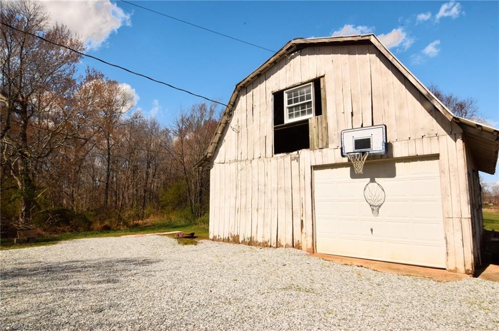 5600 Bunch Road Oak Ridge, NC 27310 - Photo 23 of 30 Front of Barn and Garage