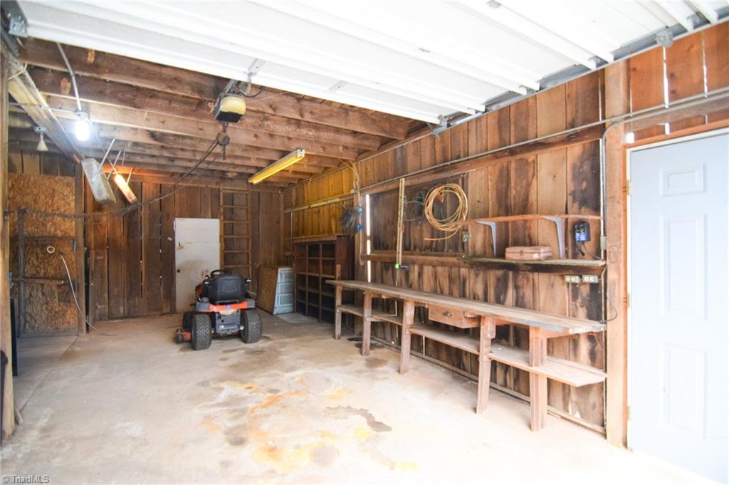 5600 Bunch Road Oak Ridge, NC 27310 - Photo 25 of 29 Barn interior: Garage bay.