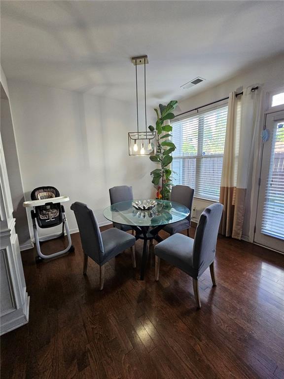 5747 Radford Loop Fairburn, GA 30213 - Photo 8 of 36 a view of a dining room with furniture window and wooden floor