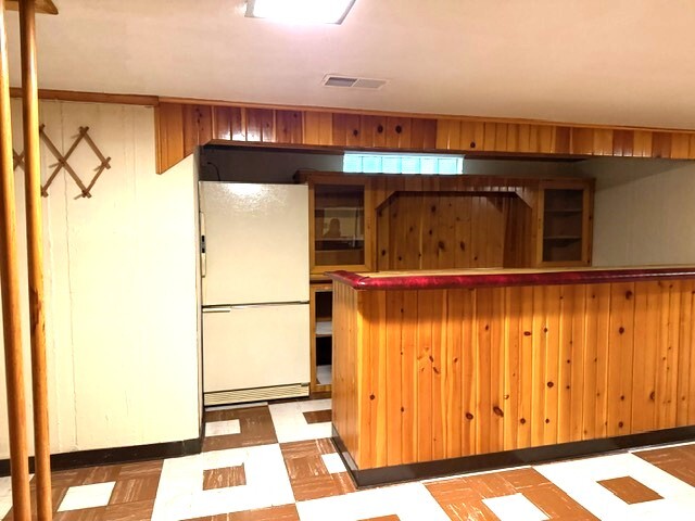 220 May Street Manhattan, IL 60442 - Photo 11 of 16 a view of a refrigerator in a kitchen