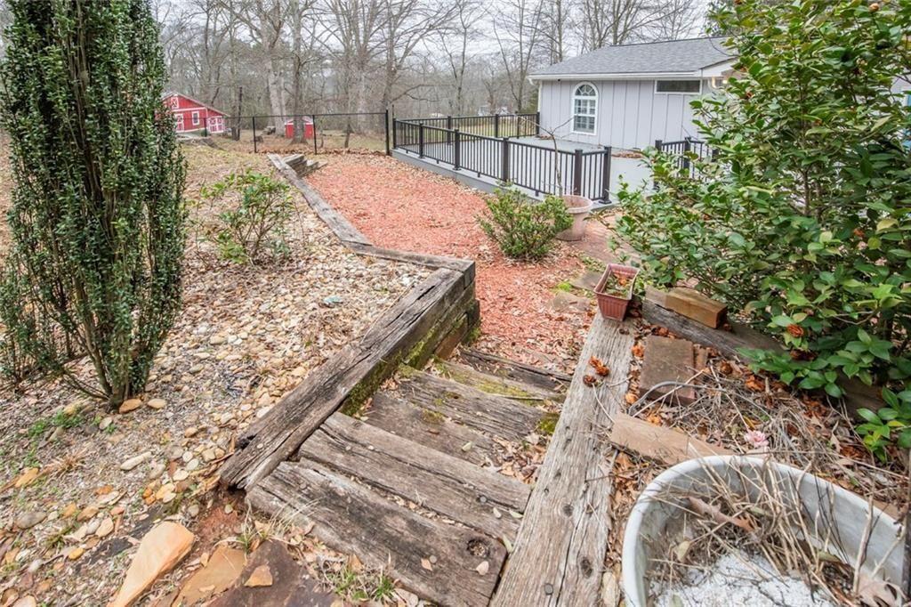 3819 Mason Creek Road Winston, GA 30187 - Photo 54 of 54 a view of a backyard with a patio