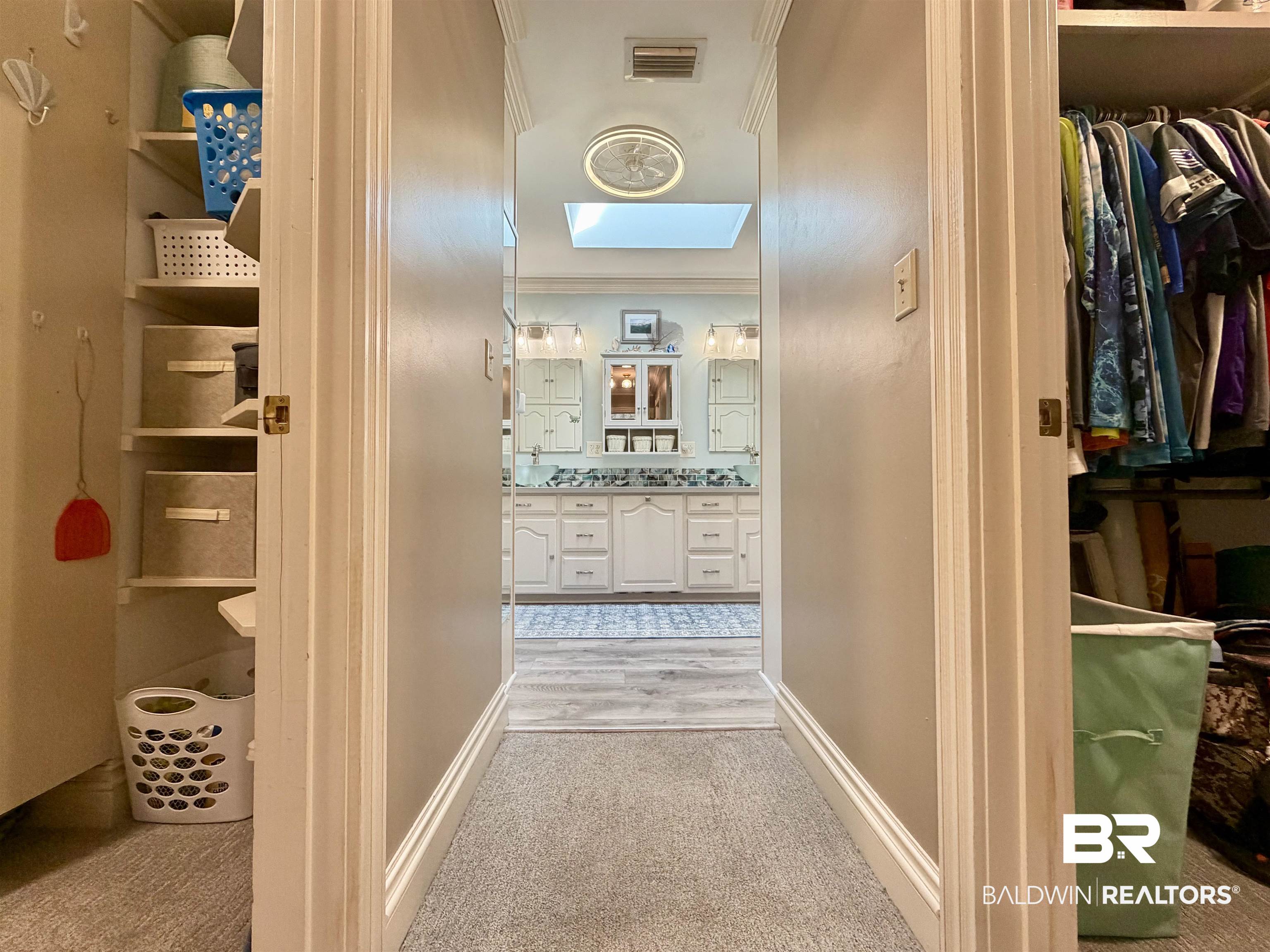 2944 Appleton Road Brewton, AL 36426 - Photo 16 of 65 Corridor featuring crown molding and light carpet