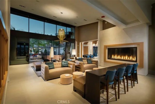 a living room with fireplace furniture and a fireplace