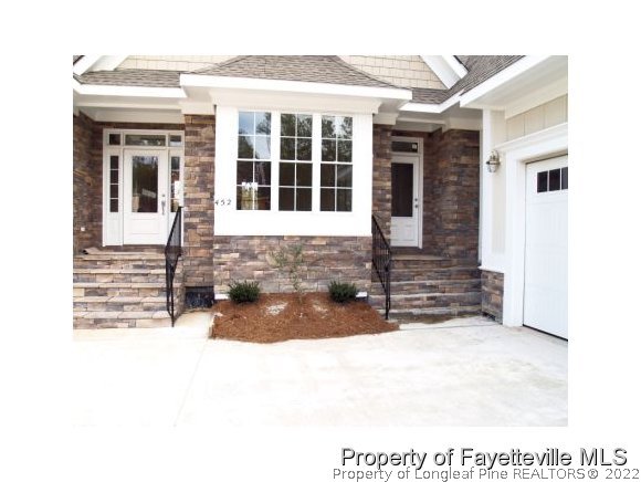 Lot 279 Falling Water Road Spring Lake, NC 28390 - Photo 1 of 12 a view of a house with a outdoor space