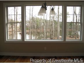 Lot 279 Falling Water Road Spring Lake, NC 28390 - Photo 8 of 12 a view of a room that has a window