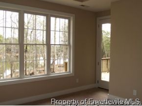 Lot 279 Falling Water Road Spring Lake, NC 28390 - Photo 10 of 12 an empty room with a window