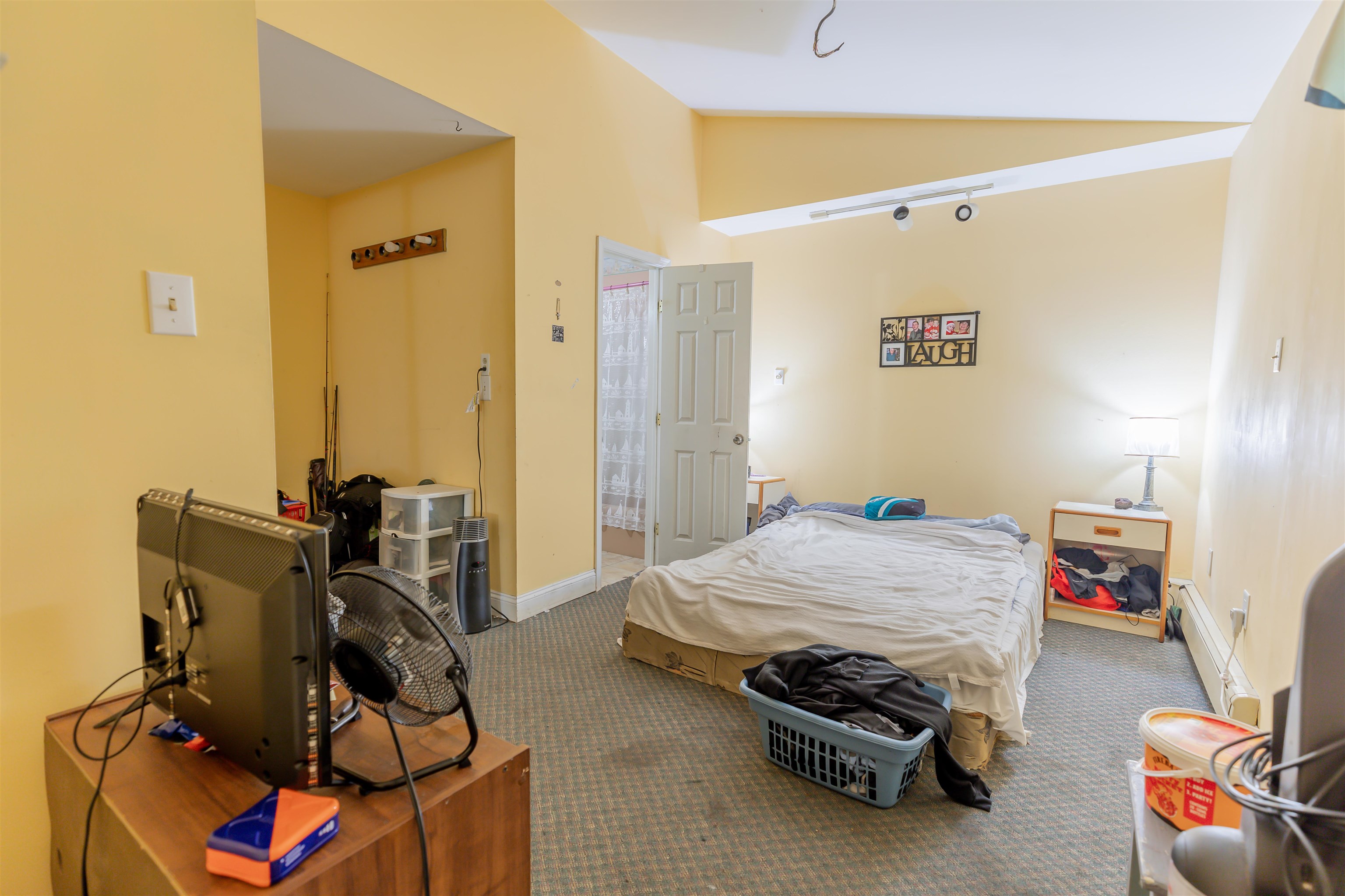62 Bayshore Road Cape May Court House, NJ 08210 - Photo 17 of 32 a bedroom with a bed and gym equipment