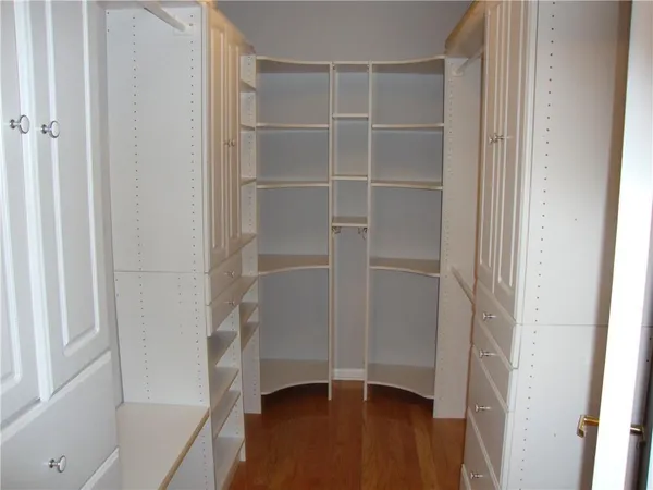a view of an empty walk in closet
