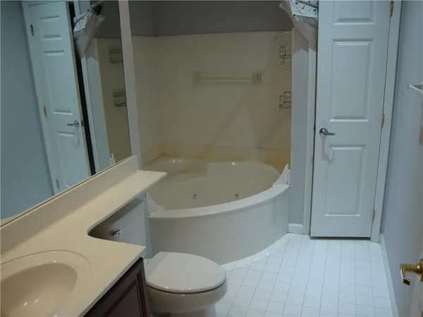 a bathroom with a sink and a toilet